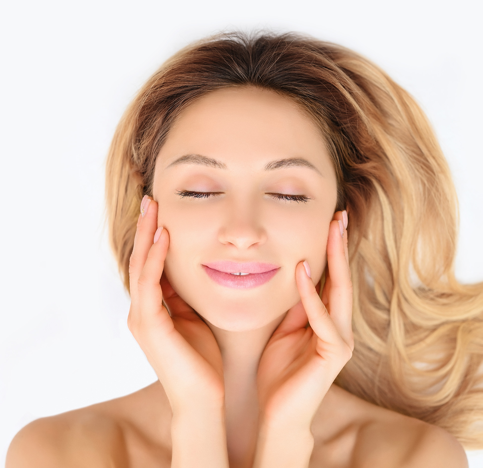 Woman with her hands on her cheeks