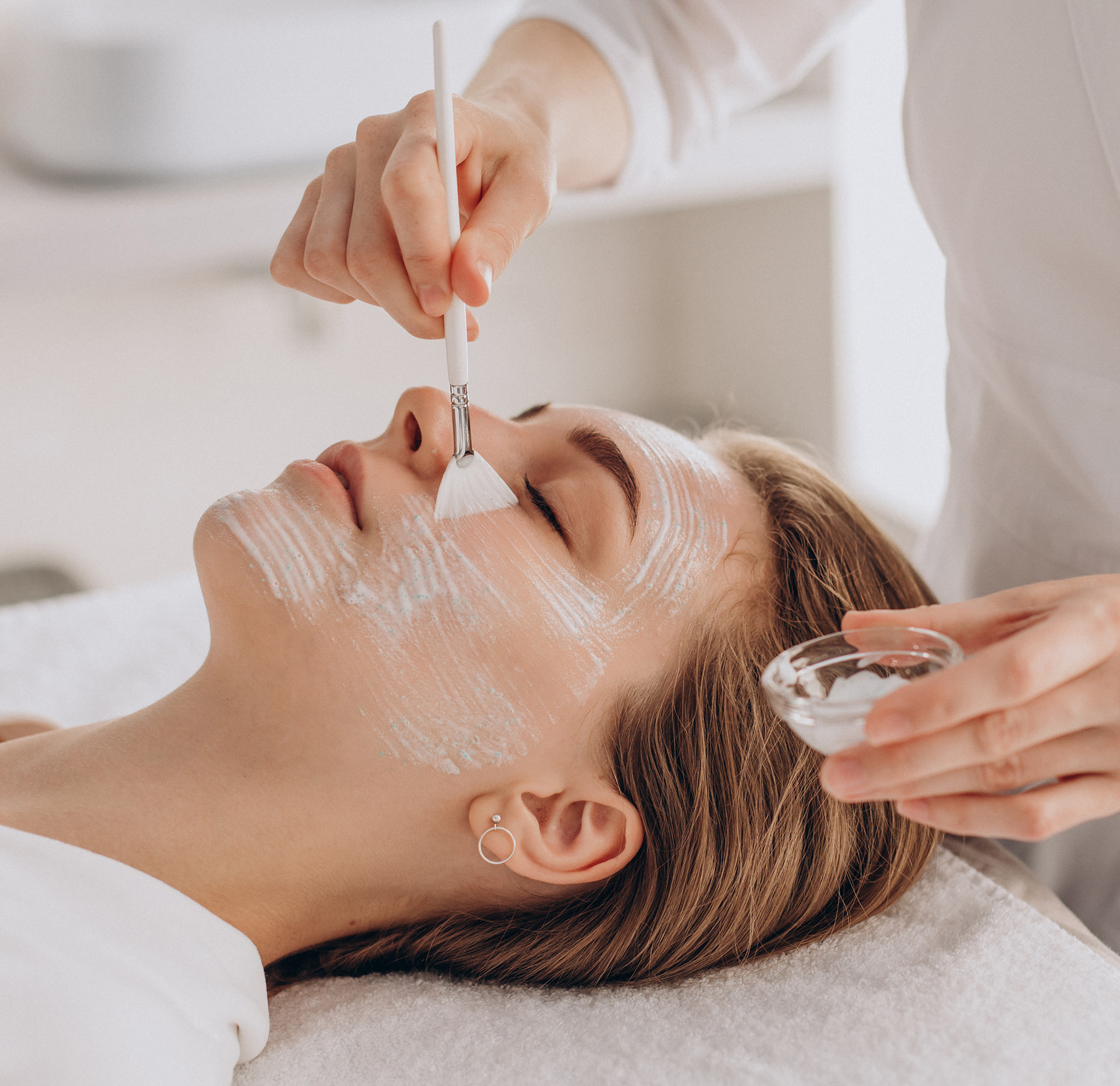 Woman getting a facial treatment